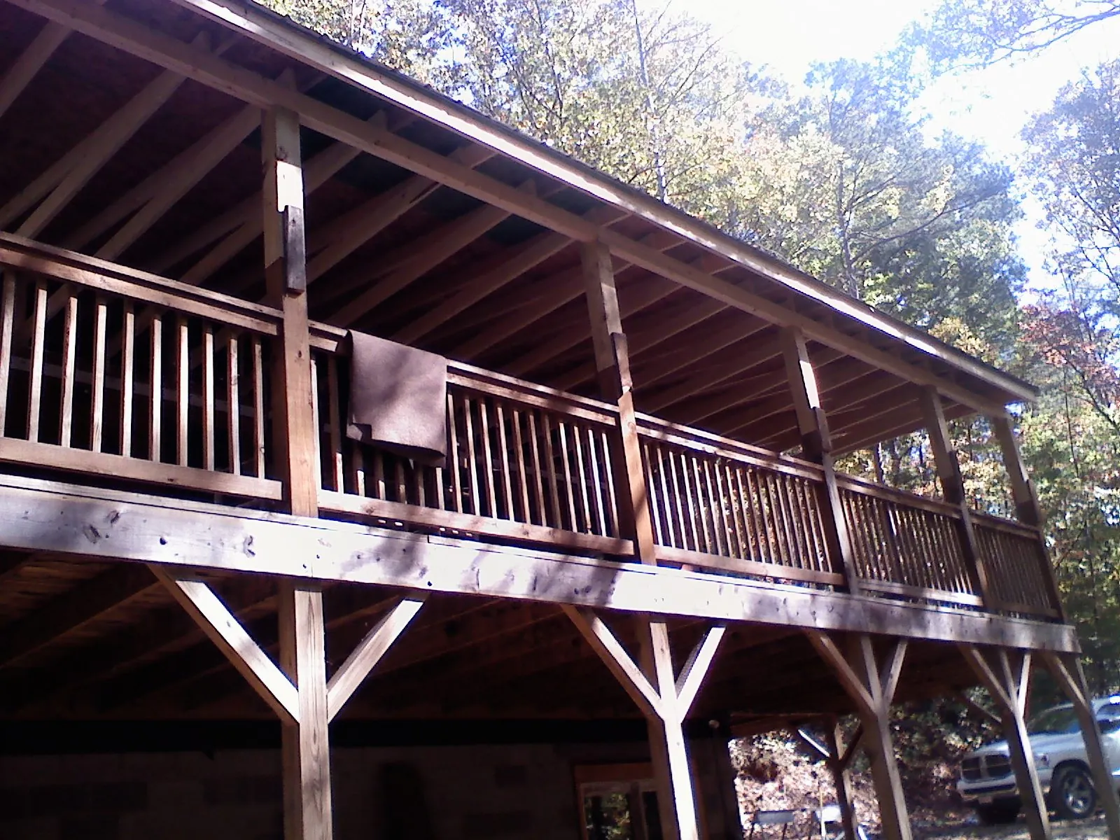 Timber framing under a new elevated porch and deck — Roof Leak Repair in Metaline Falls by Roofing Brothers